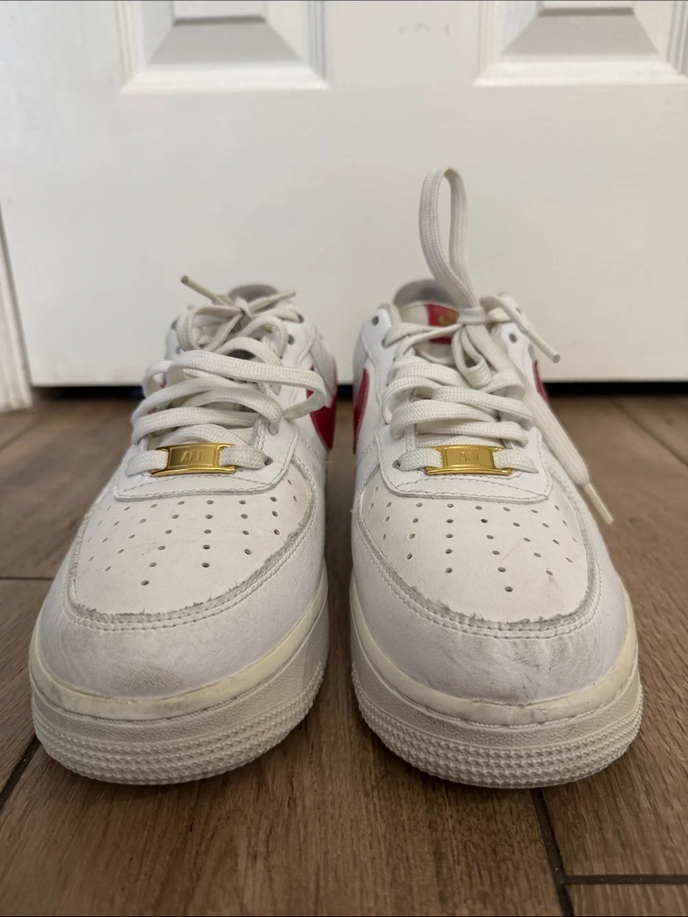 Nike Air Force 1 '07 ESS White Sneakers with Red Swoosh